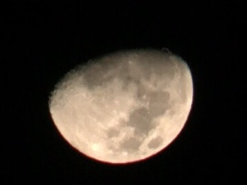 Moon store through binoculars